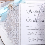 Silver and white laser cut invitation, turquoise ribbon, spring and summer, winter, wonderland, whimsical 