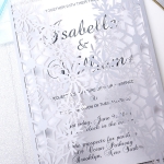 Silver and white laser cut invitation, turquoise ribbon, spring and summer, winter, wonderland, whimsical 