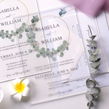 Modern vellum floral wedding invite with dusty blue ribbon spring